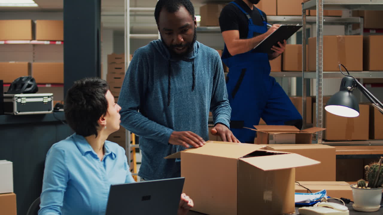 Warehouse Employees Packing Boxes