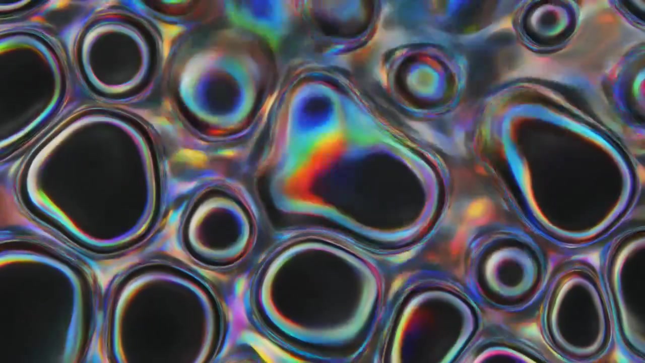 Bolle liquide iridescenti astratte che si muovono al rallentatore.