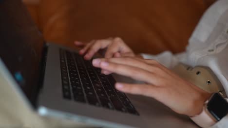 Person Typing on a Laptop