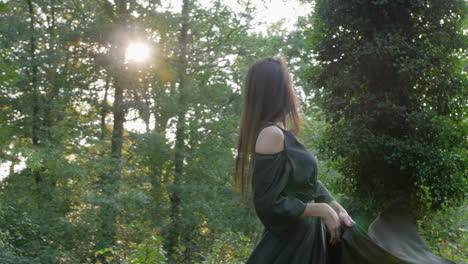 east european girl wearing and dancing with her black dress in slow motion