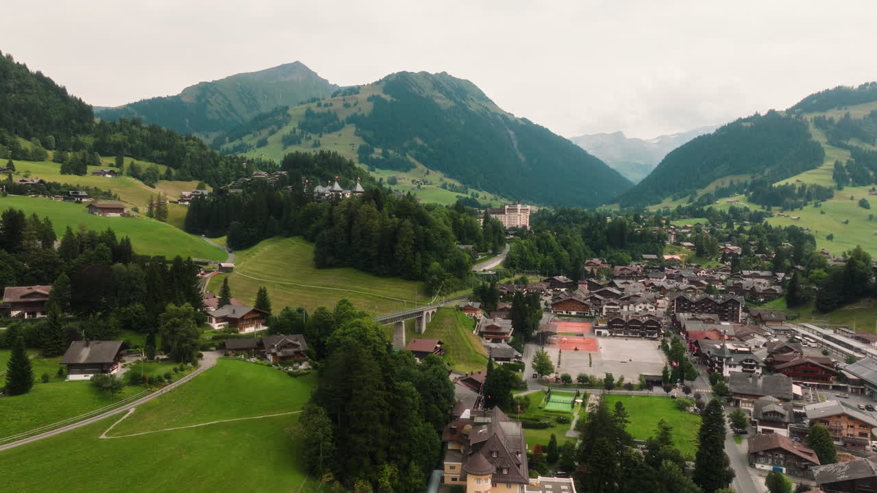 Aerial view of the beautiful town of Gstaad in a scenic Swiss Alps valley