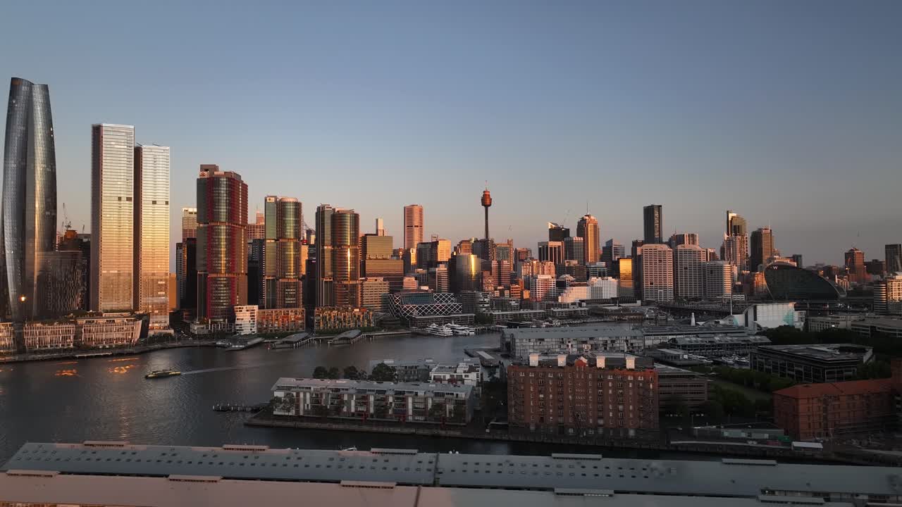 Sunset Scenery with skyscrapers At Darling Harbour In Sydney, Australia - Drone Shot