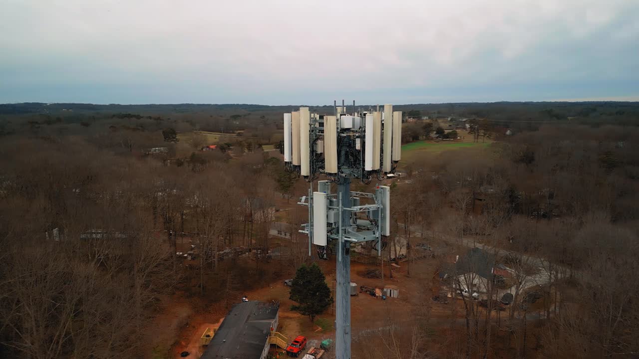 Aerial Shot Rotating Around Cell Phone Tower in Nature. 4K Drone Footage