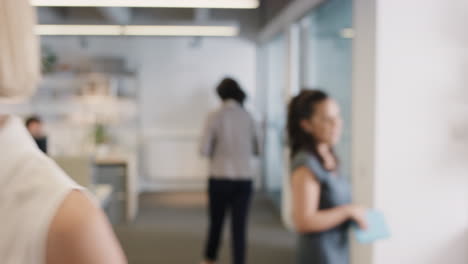 Beautiful-businesswoman-checking-smart-watch-leaving-busy-office-meeting-achievement-success-smiling-happiness