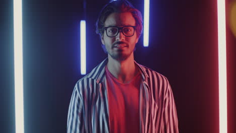 excited man in neon lights