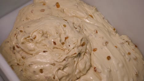 preparing raisin bread dough