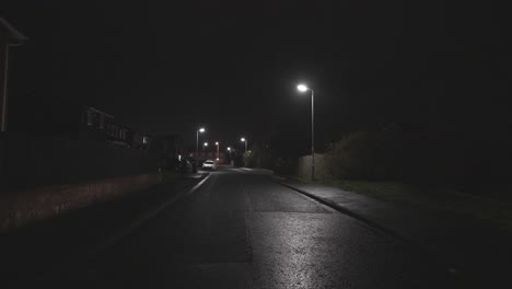 a typical town street in the uk at night