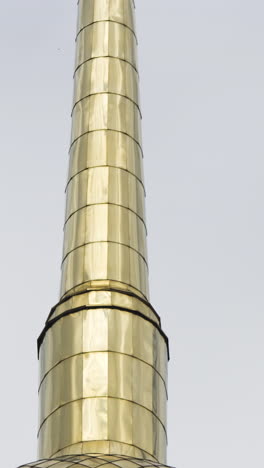 golden spire of a church