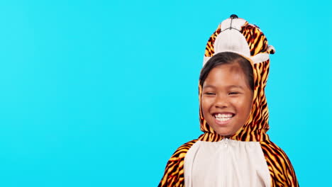 Tiger-costume,-laughing-and-face-of-girl-in-studio