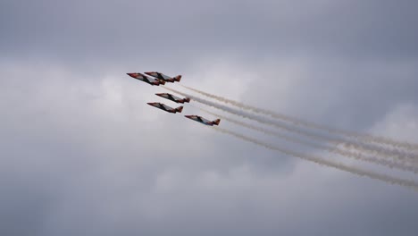 The Patrulla Águila is the aerobatic team of the Spanish Air Force. They fly side by side at the air show called Airpower