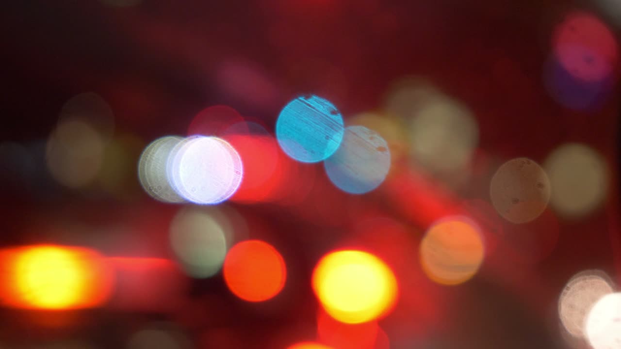 luces de bokeh coloridas en 4k movimiento lento 60 fps