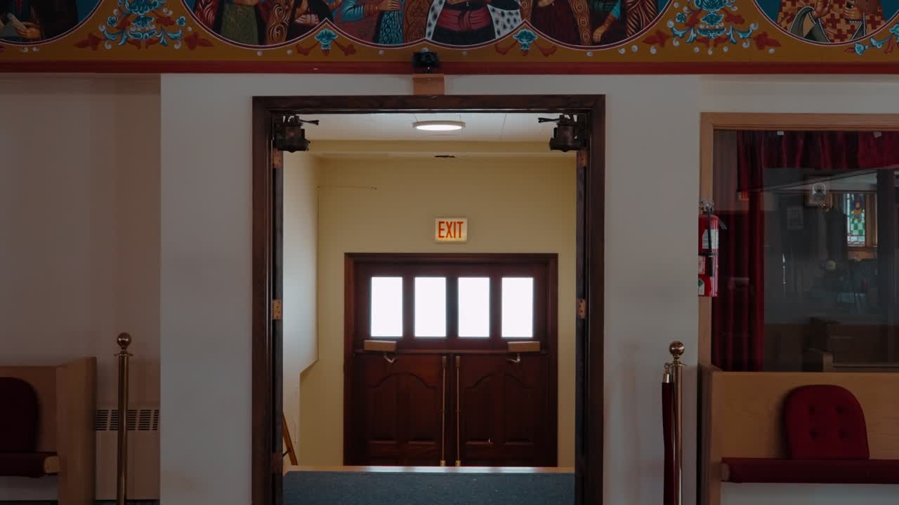 Entrance and exit of Vibrant Orthodox Iconography Church Entrance in Byzantine Style. Chicago, Illinois, USA.