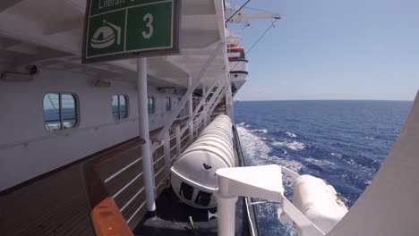 starboard right hand side of a cruise ship out at sea on the open ocean