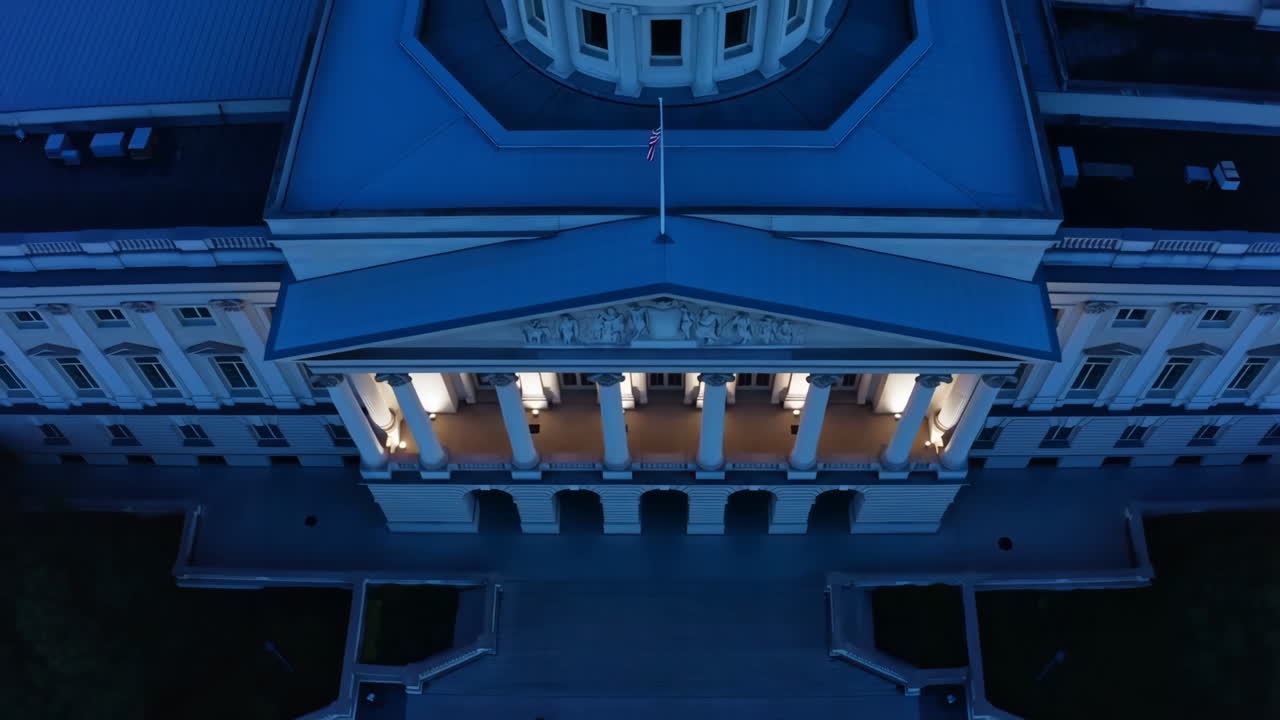 Aerial View of an Illuminated Capitol Building at Night