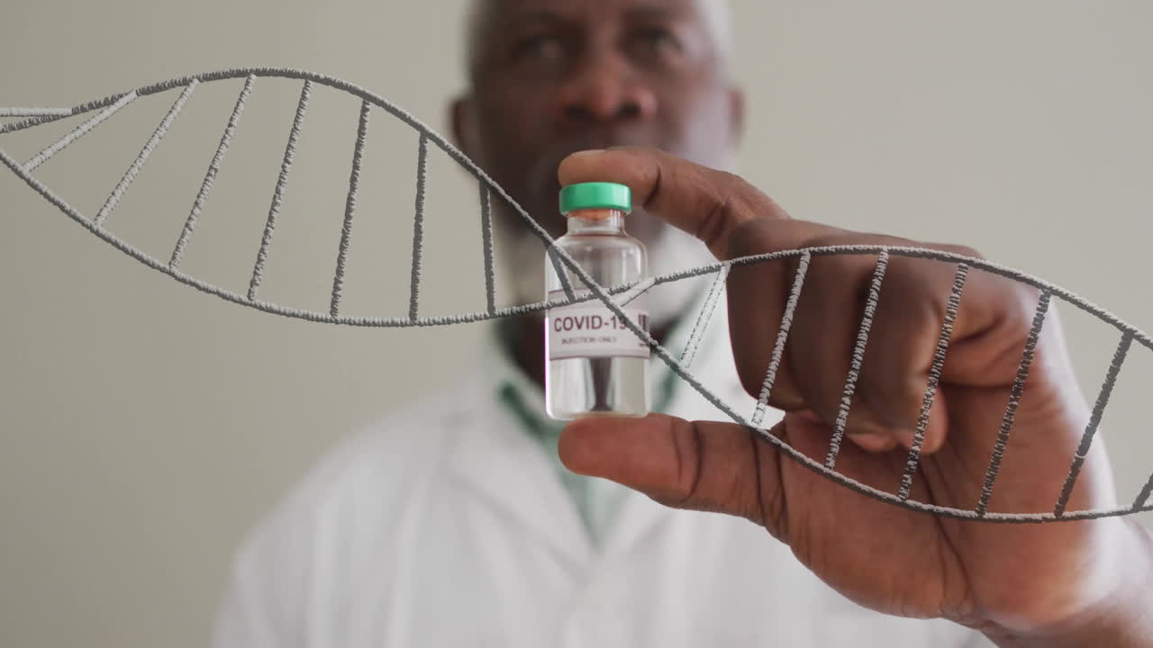 Animation of dna strand over african american male doctor holding vial