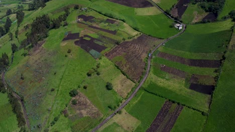 Cinemati-aerial-revealing-clip-of-a-mountain-in-Puichig,-Equador