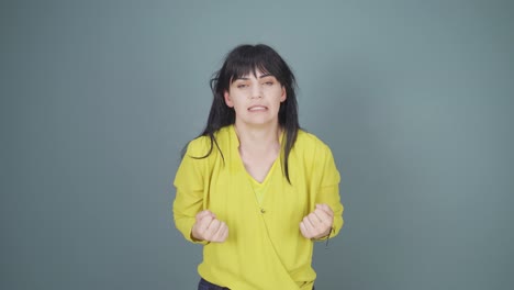 woman having a nervous breakdown in front of the camera.