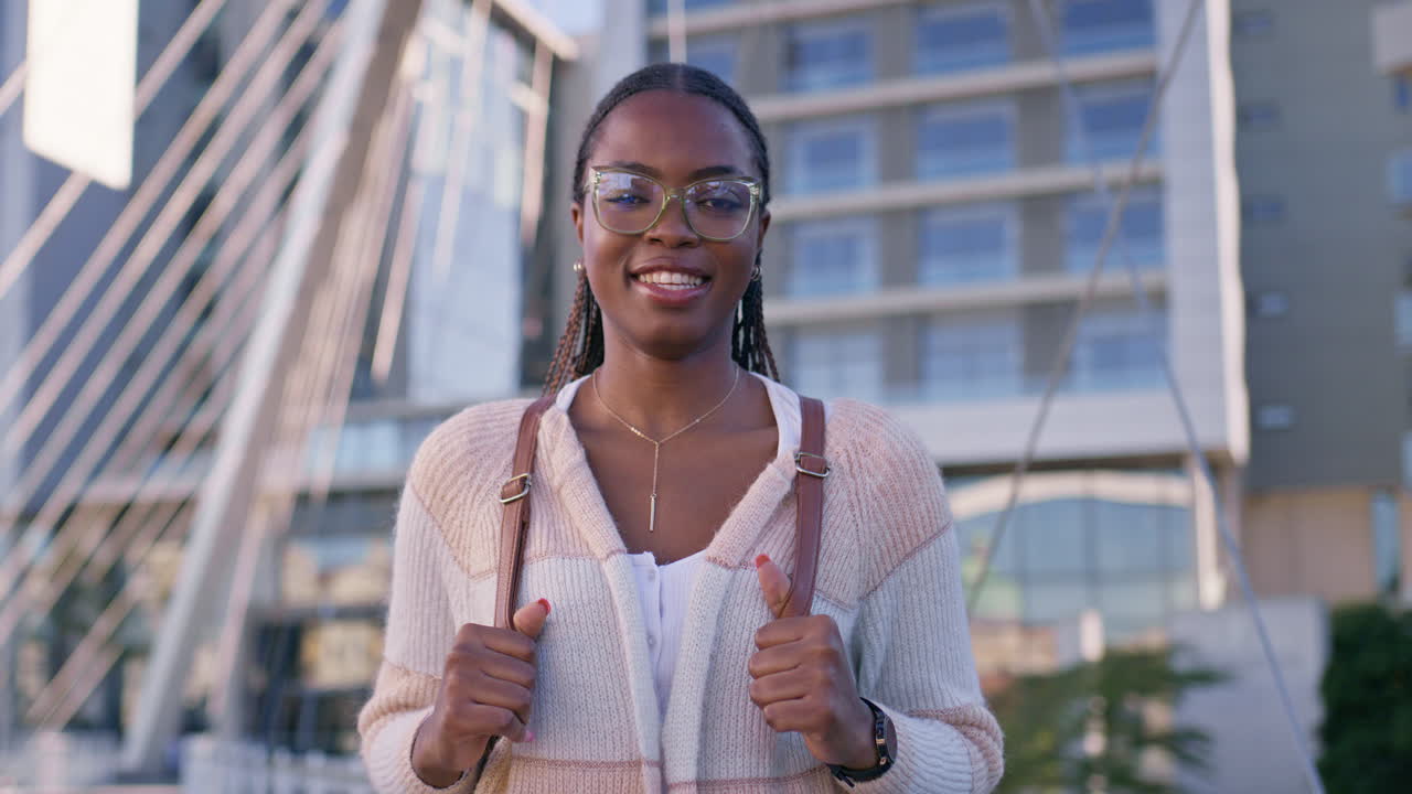 Woman with glasses in urban setting