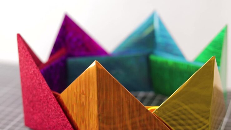Close up details, rainbow crown handmade with PVC paper in metallic colors