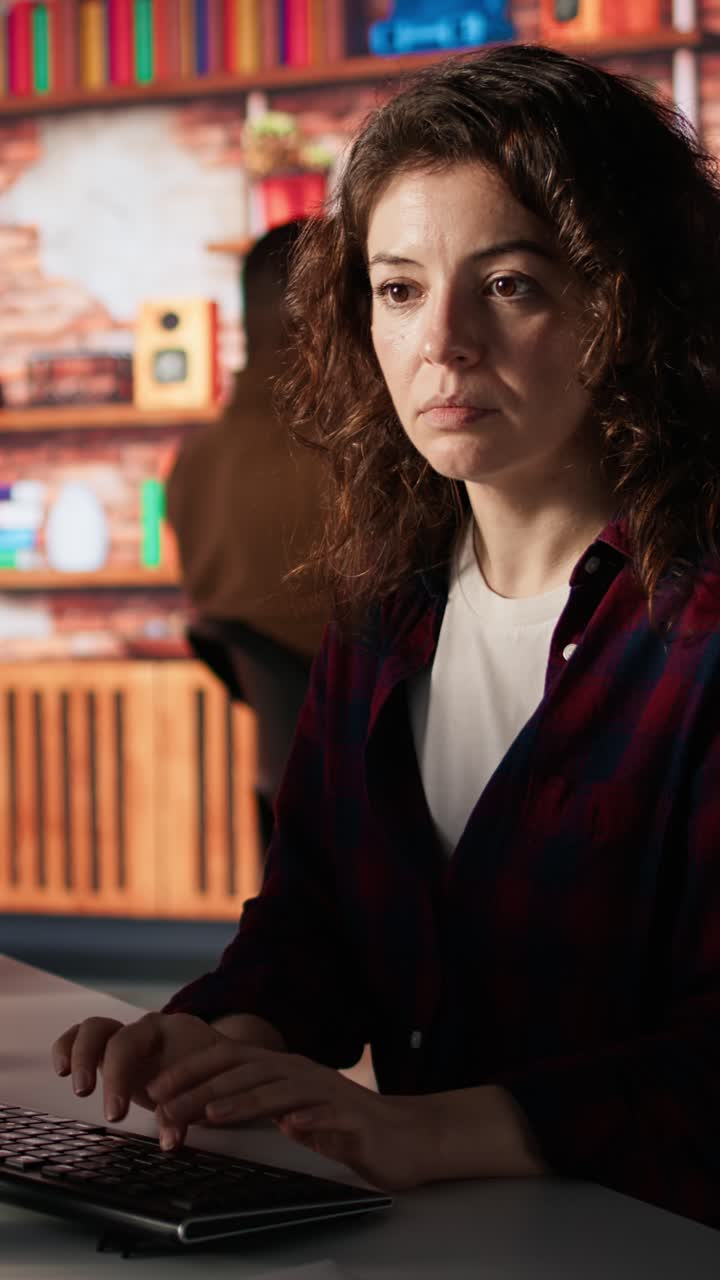 Vertical video Portrait of upbeat programmer coding advanced AI algorithm in startup