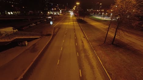 night traffic timelapse: cars on urban freeway in helsinki finland