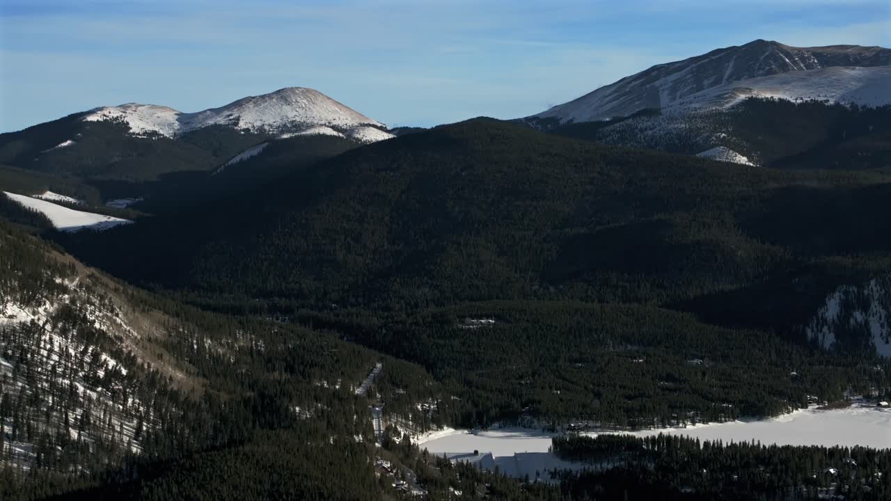 Boreas Hoosier Pass Bald Mountain Blue River Valley Rocky Mountain mining town Breckenridge Colorado aerial drone late afternoon mid winter January December ski snowboard mountain town downward motion