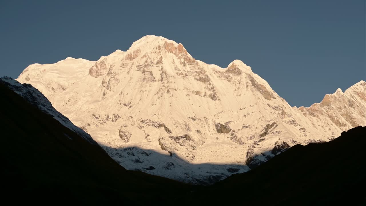 Snowcapped Mountains and Clear Blue Sky, Snowy Winter Himalayas Mountains Covered in Snow in Nepal, Annapurna Mountain Range a Popular Hiking and Trekking Area in Nepal