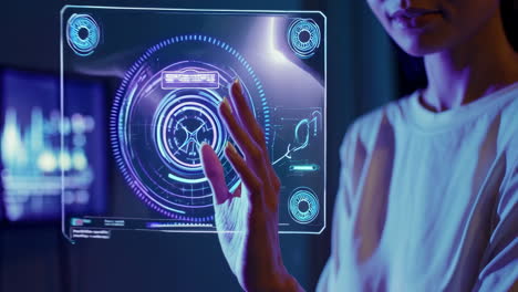 woman's hand interacting with a futuristic holographic display