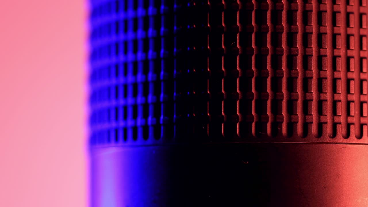 Focus ring of a macro lens, close up view under red and blue lights