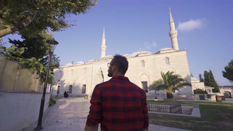 Muslim-young-man-going-to-mosque.