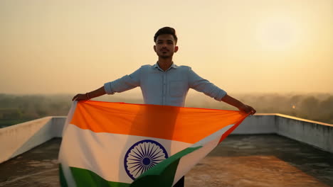 man holding indian flag