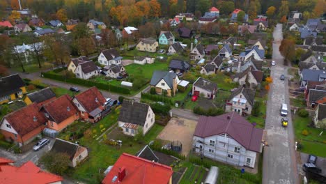 simple eastern european houses in village on a grey autumn day