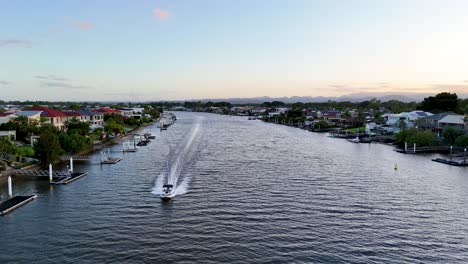 boats cruising along scenic nerang river