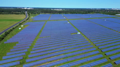 large solar farm in germany, providing clean and sustainable energy. amazing aerial view flight drone shot footage from above
