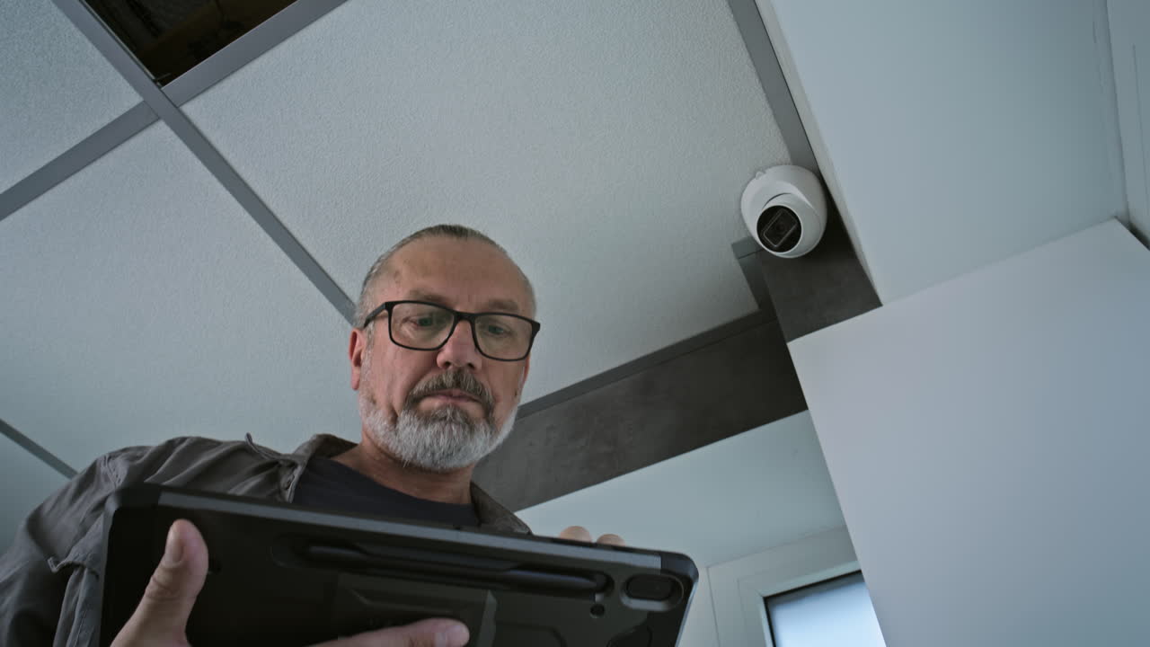 Installing Security Camera and Inspecting Tablet