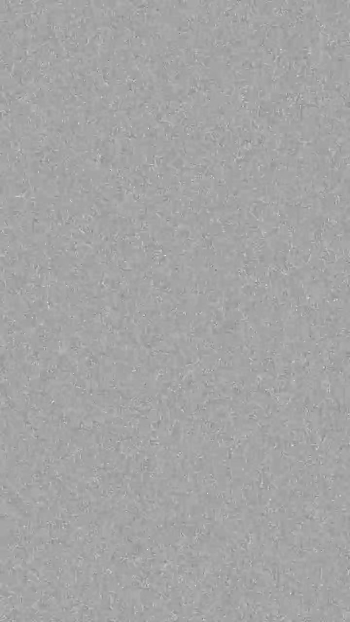 Pystyformaatin 16 mm filmirae-peittokuva aidolla kohinalla ja pölyllä retro-dokumenttityyliseen ulkoasuun, saumaton silmukka.