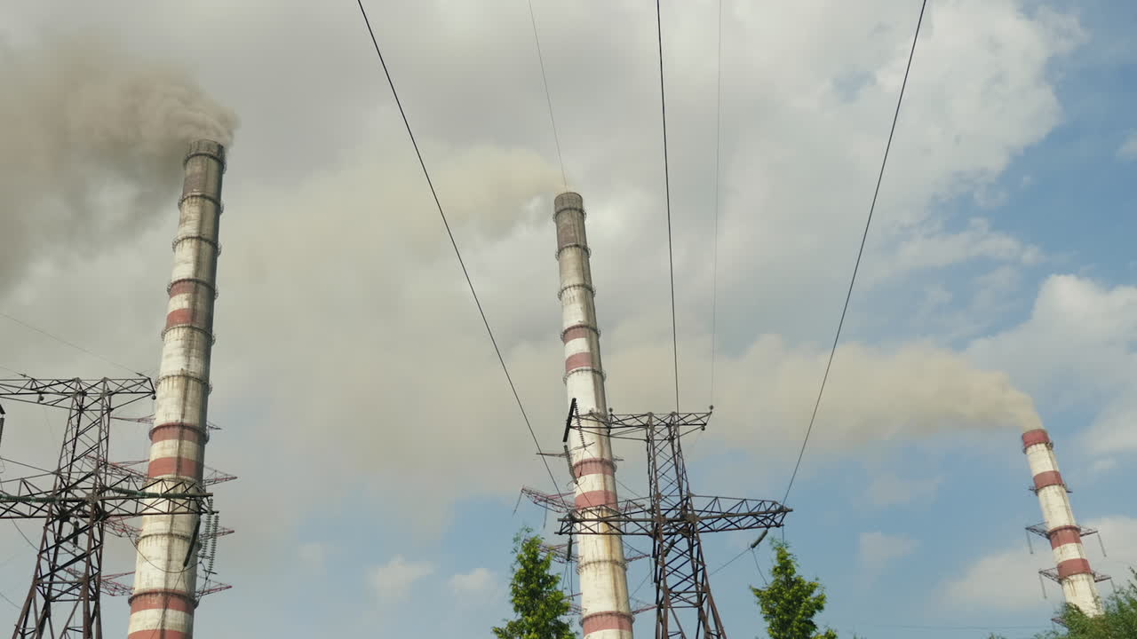 A Pipe Of A Chemical Plant Billowing Thick Black Smoke