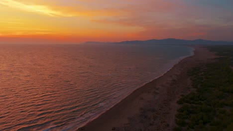 Sunset-at-the-beach-seaside-coast,-pine-trees-and-lagoon-swamp