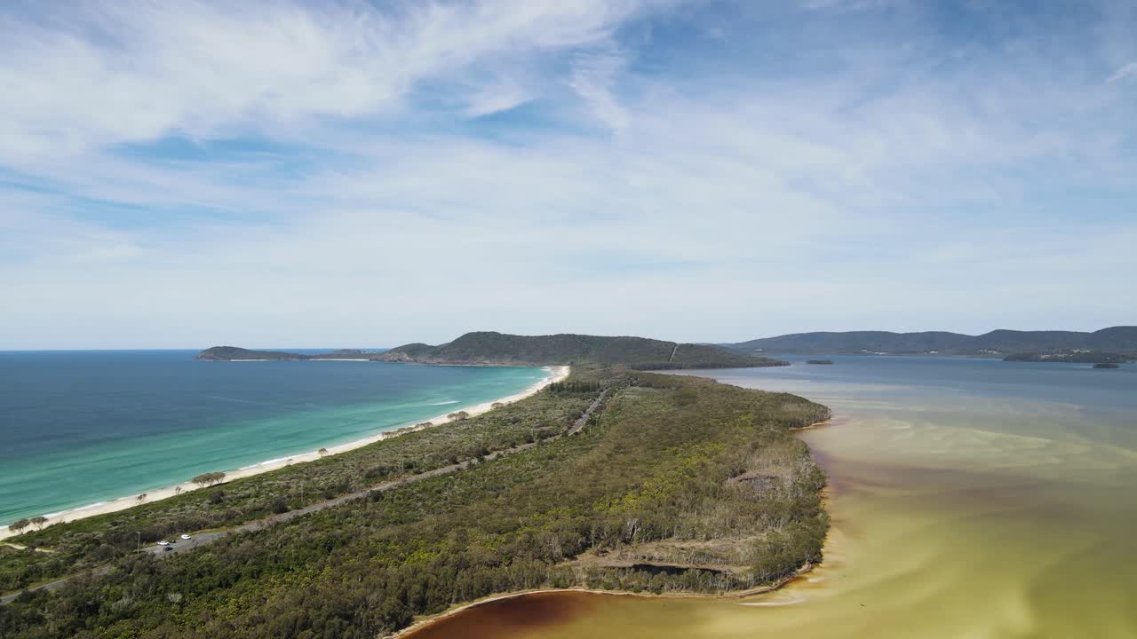 Scenic coastal road leading into the isolated seaside village of Seal Rocks, a popular holiday destination along the Barrington Coast Australia