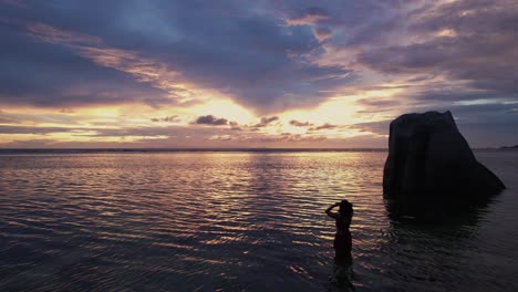 girl in beach during sunset