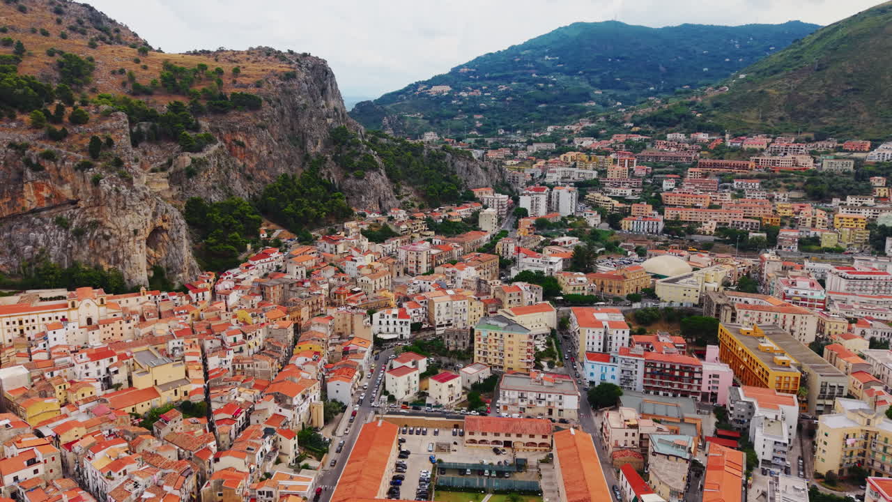 Cefalù, Sicily aerial view of colorful coastal town surrounded by hills