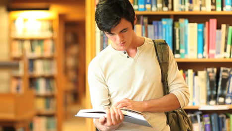 Young-man-reading-a-book