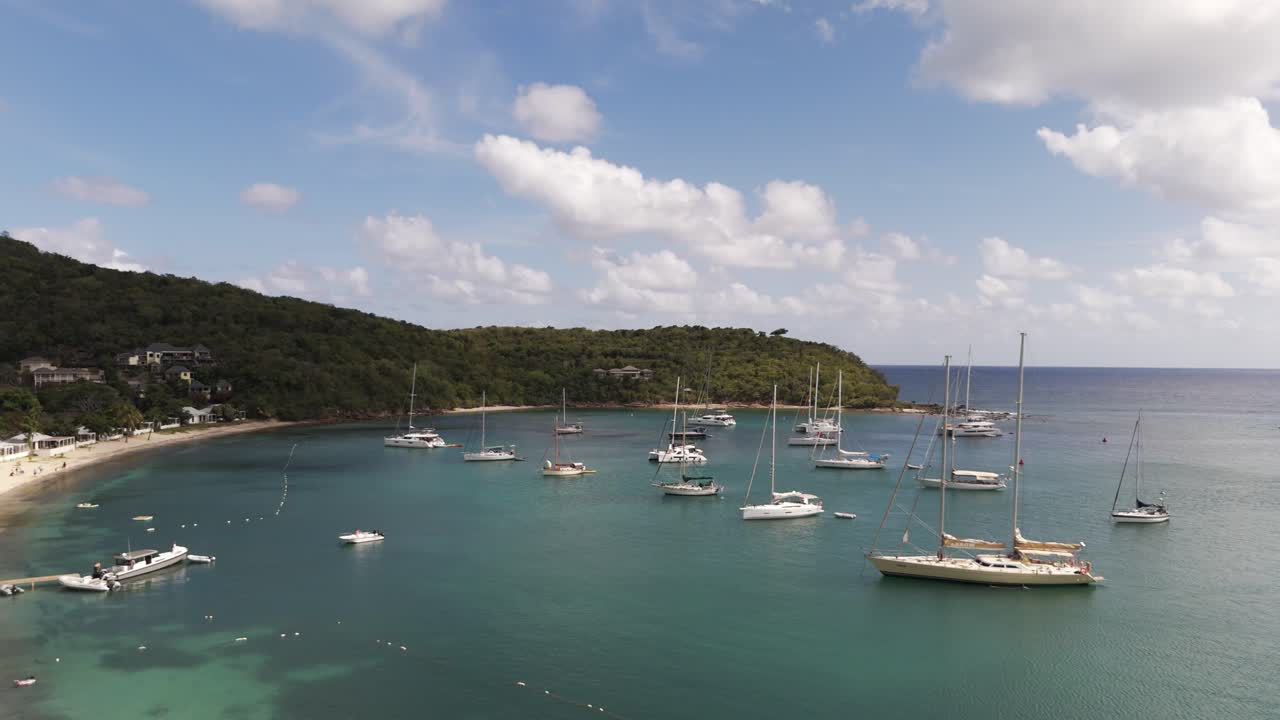 Luxury Yachts at Anchor in a Tropical Bay