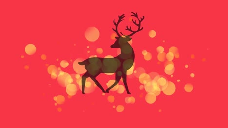 Yellow-spots-of-light-over-black-silhouette-of-reindeer-walking-against-red-background