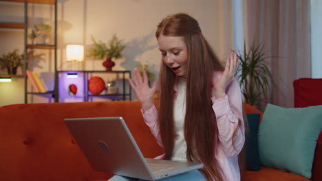 amazed child girl use laptop computer, receive good news message, shocked by victory, celebrate win