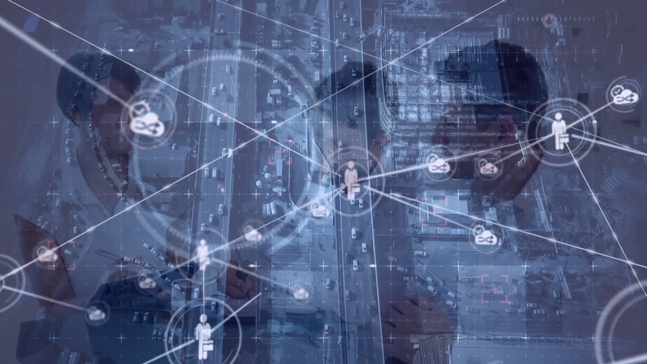Animation of connected icons, aerial view of vehicles on road, diverse coworkers discussing ideas