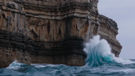 powerful waves crashing against coastal cliffs