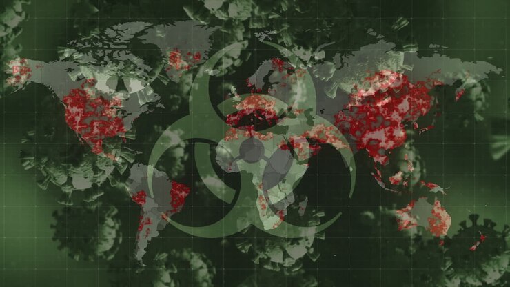 Biohazard symbol and multiple covid-19 cells floating against world map on green background