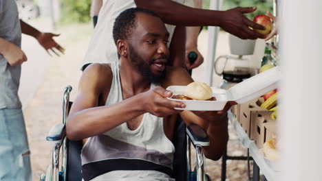 wheelchair-bound man receives free food