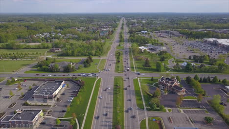 aerial drone shot of a busy divided highway in grand rapids, michigan